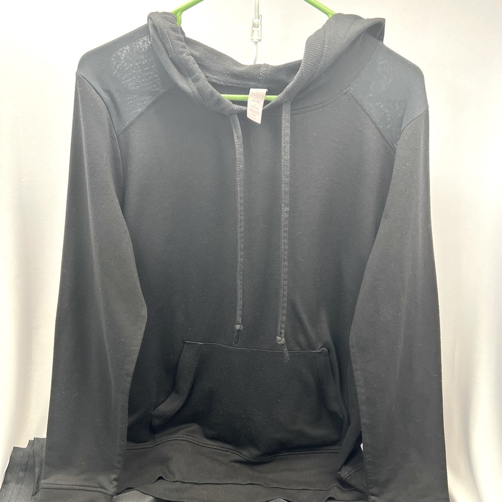 Balance Collection lightweight pullover mesh shoulders.  Womens size L black
